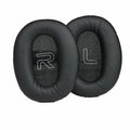 Black protein skin oval earphone sleeves for Walker W820BT headphones on a surface