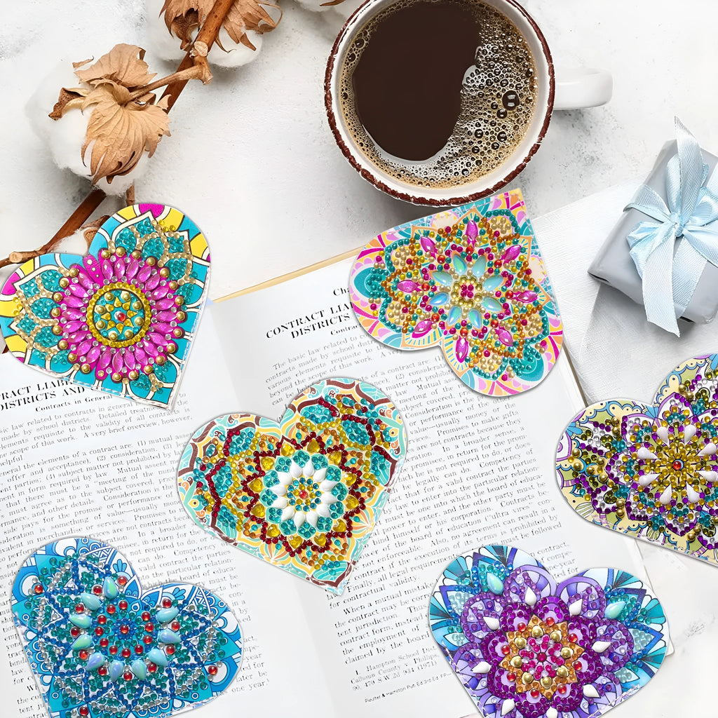 Set of six handmade PU leather bookmarks with crystal floral cornerites on a white background.