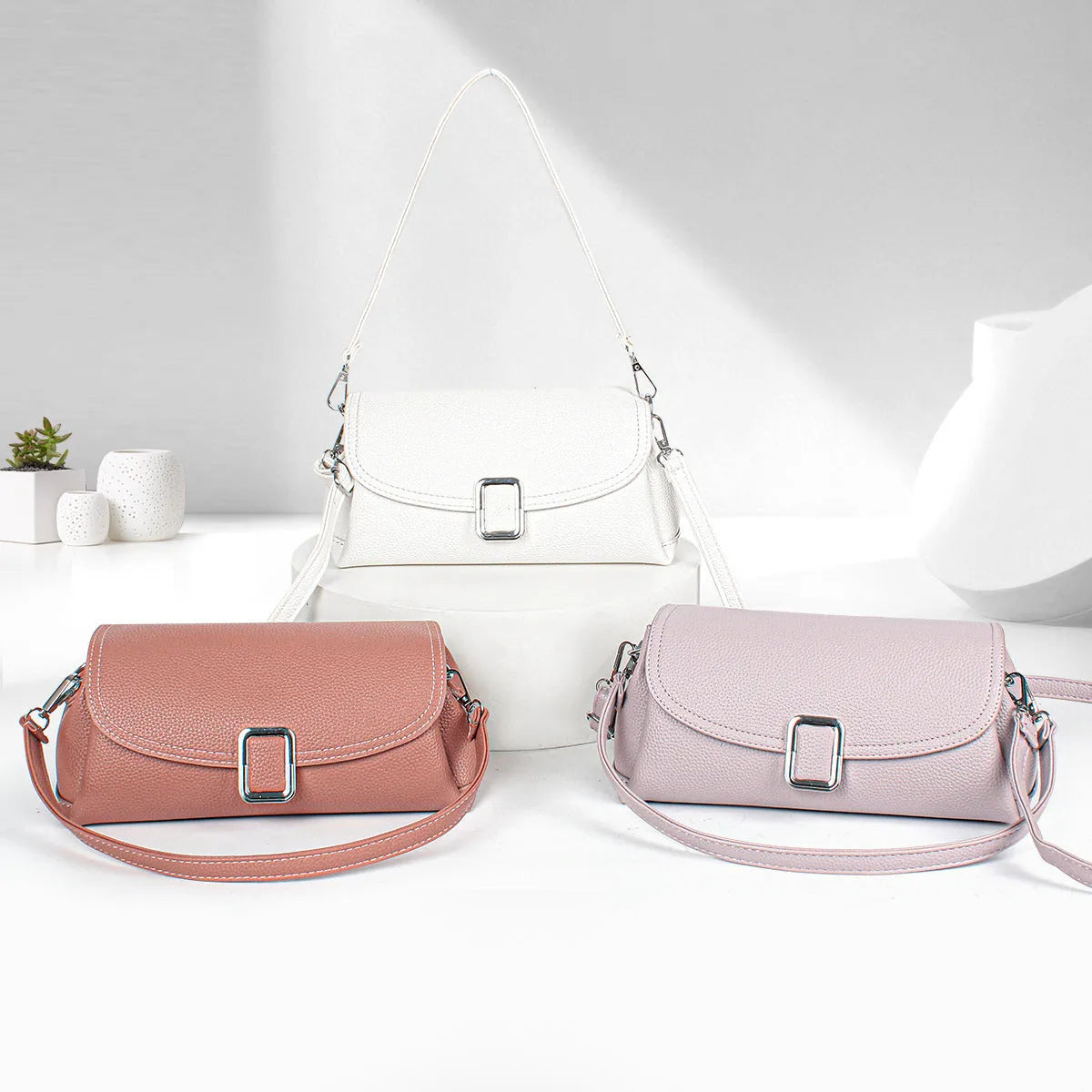 Women's PU shoulder handbag in beige, showing front view with adjustable strap.