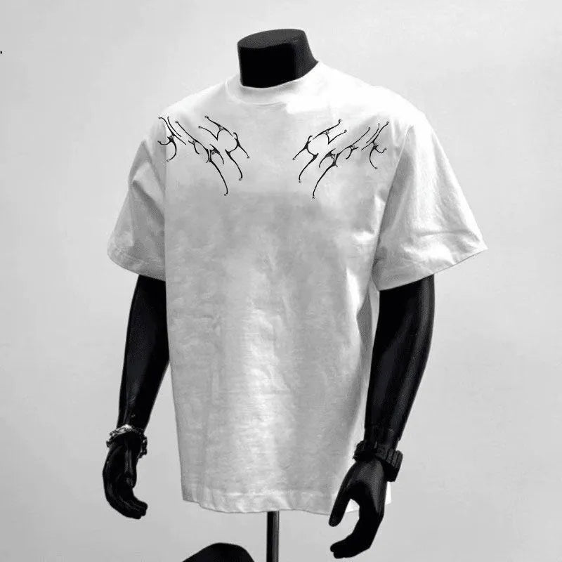 A man wearing a loose-fit black pure cotton short sleeve t-shirt, suitable for business casual settings.
