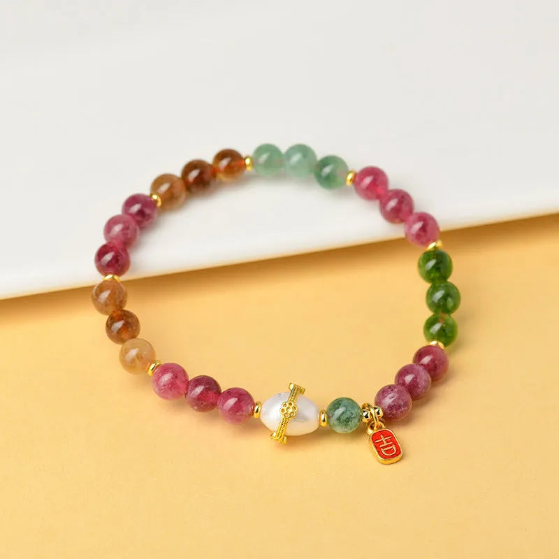 Geometric natural chalcedony bracelet for men and women with 6.5mm beads in optimised tourmaline colour.