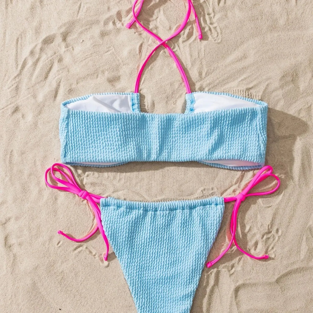Women's two-piece halter swimsuit with lace-up back in solid colour