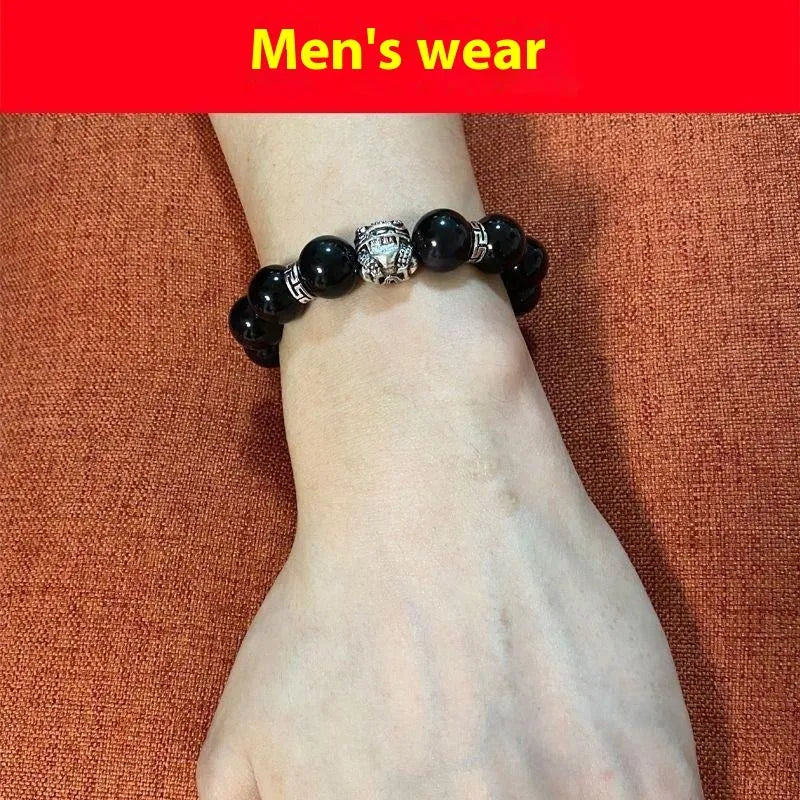 Natural obsidian bracelet with silver 999 clasp, showing cloud year pattern and lucky colour eye beads.