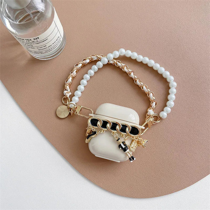 Off-white silicone AirPods case with pearl charm, five-piece set