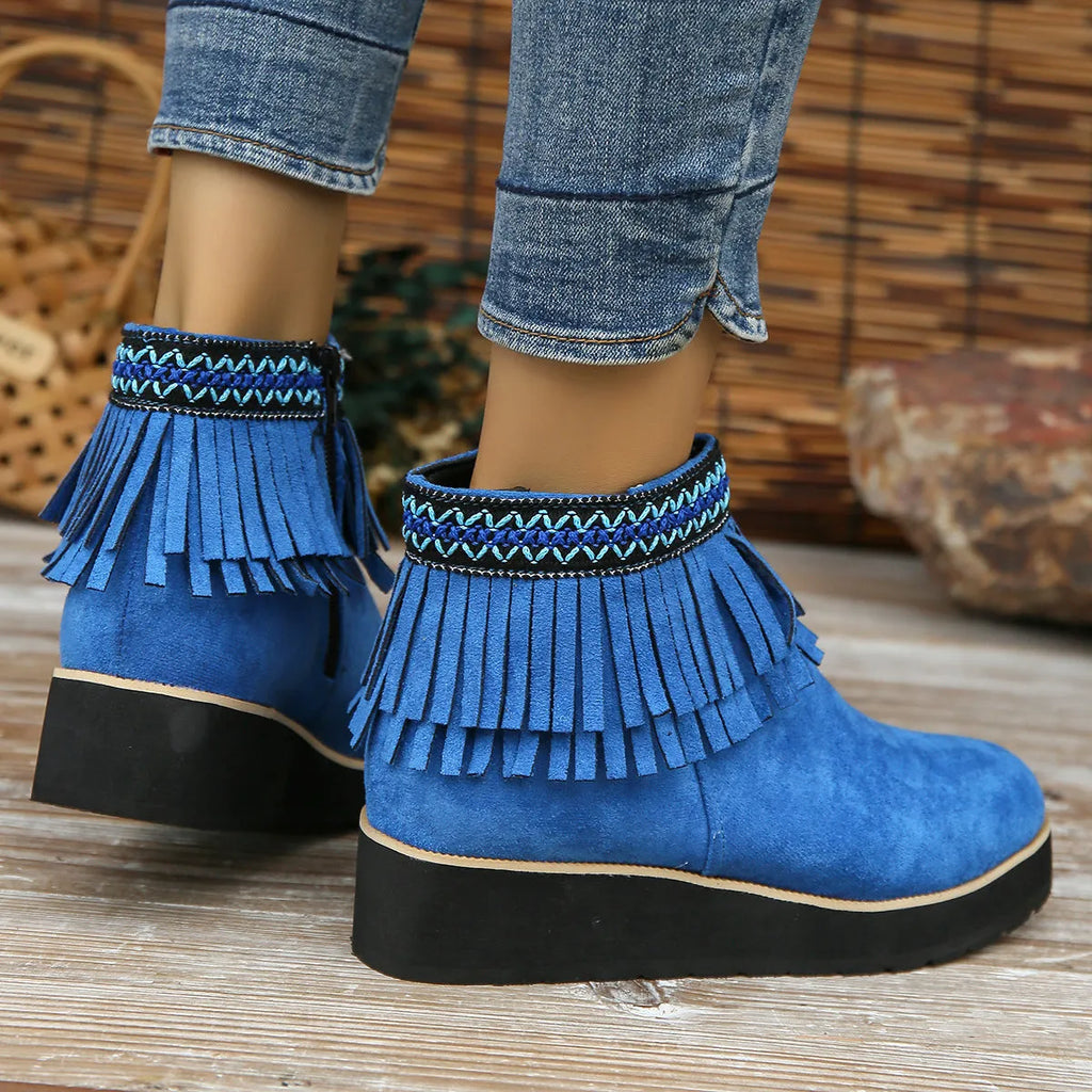 Women's suede wedge ankle boot with thick rubber sole and side zip in black, blue, or dark brown