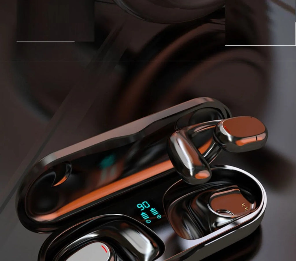 Black and white wireless Bluetooth stereo earphones with a charging case on a table