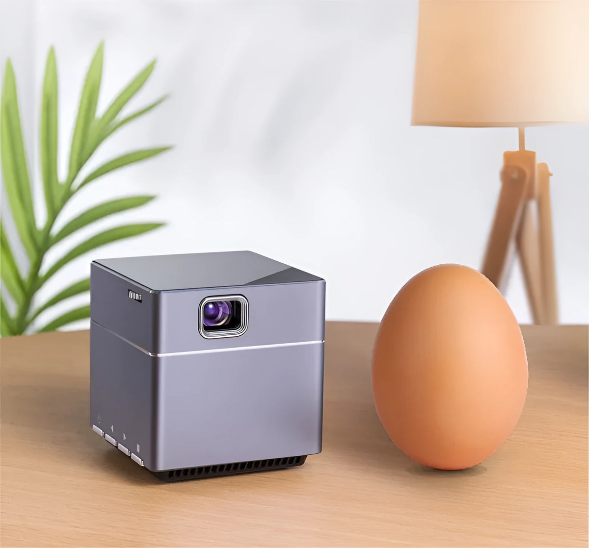 Small portable HD projector with wireless hand connection and 3400mAh battery for outdoor camping