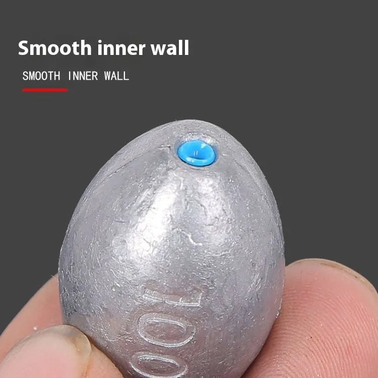Tongxin lead fishing sinker with scale pattern, rugby shape, in weights from 10g to 150g