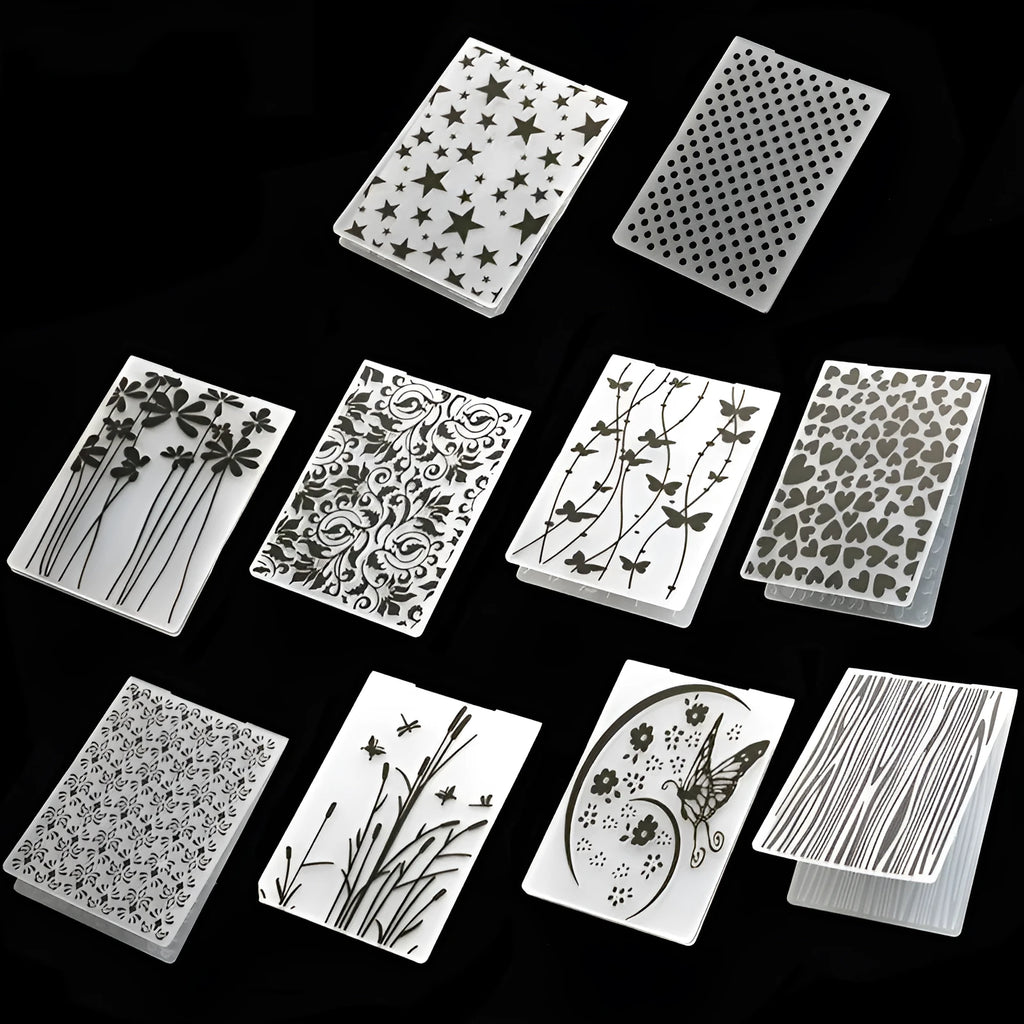 Set of plastic folding cake decorative moulds showing windmill, star, flower and butterfly designs.