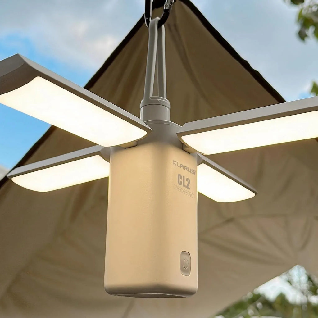 White and green rechargeable outdoor camping lamp with USB charging cable