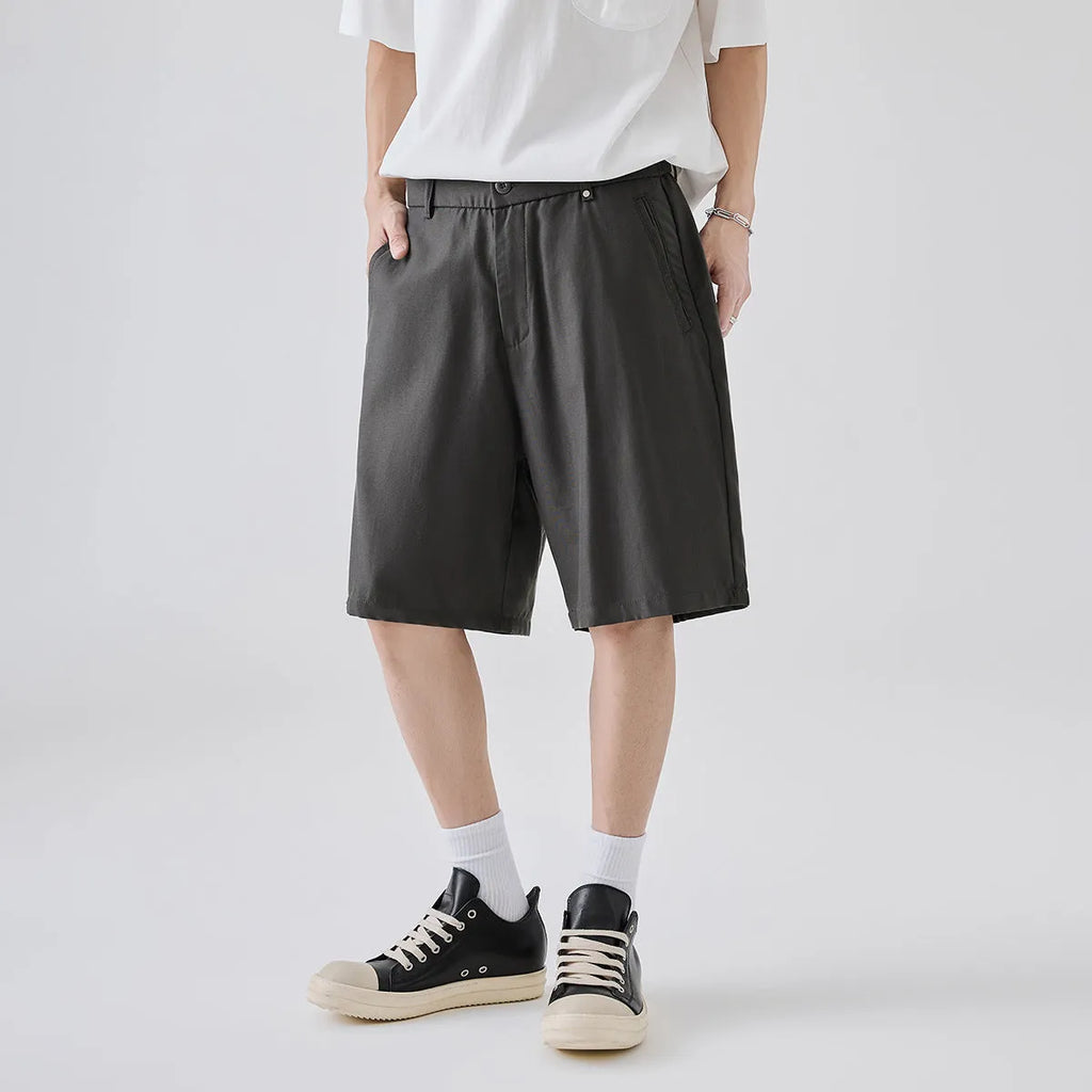 Men's loose-fit lyocell blend casual shorts in apricot colour with elastic waistband