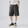 Men's loose-fit lyocell blend casual shorts in apricot colour with elastic waistband