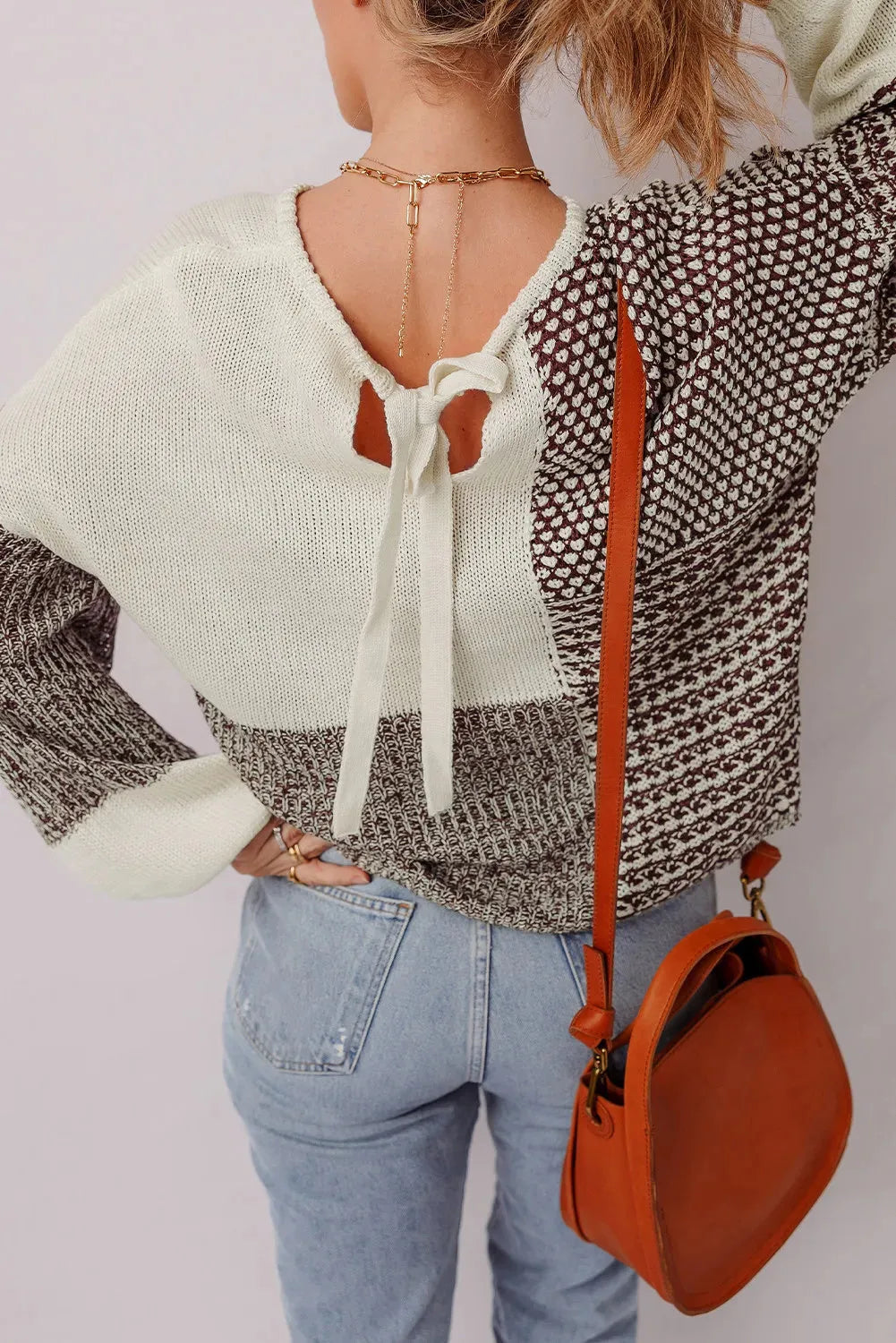 Dark khaki colour block women's long sleeve sweater with back tie detail and drop shoulders.
