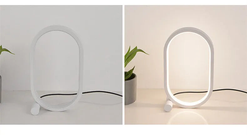 USB plug-in oval acrylic touch lamp with dimmable LED, metal body, on a bedside table