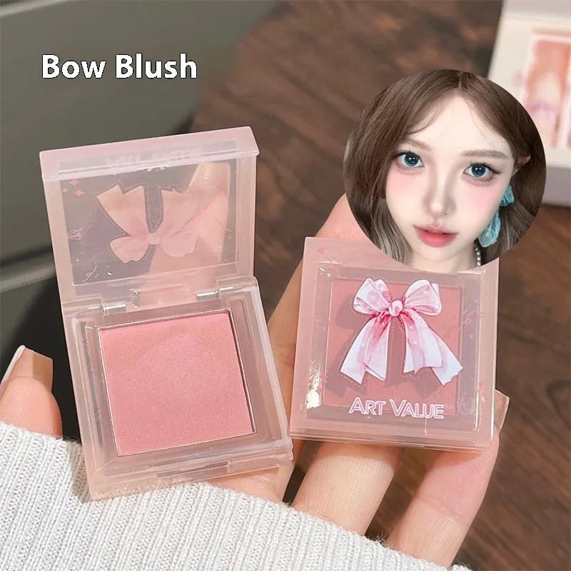 Butterfly Box makeup set showing pink lip muds, blush and butterfly necklace