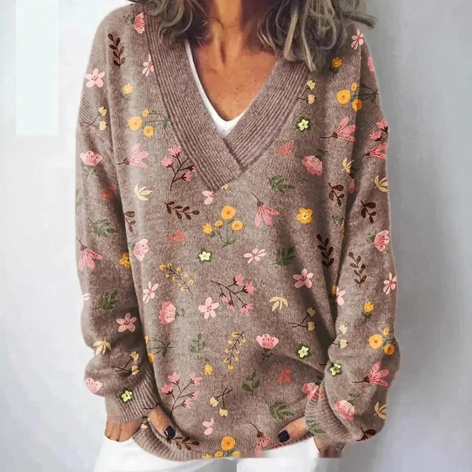 Women's V-neck long sleeve sweatshirt with a 3D floral print pattern.