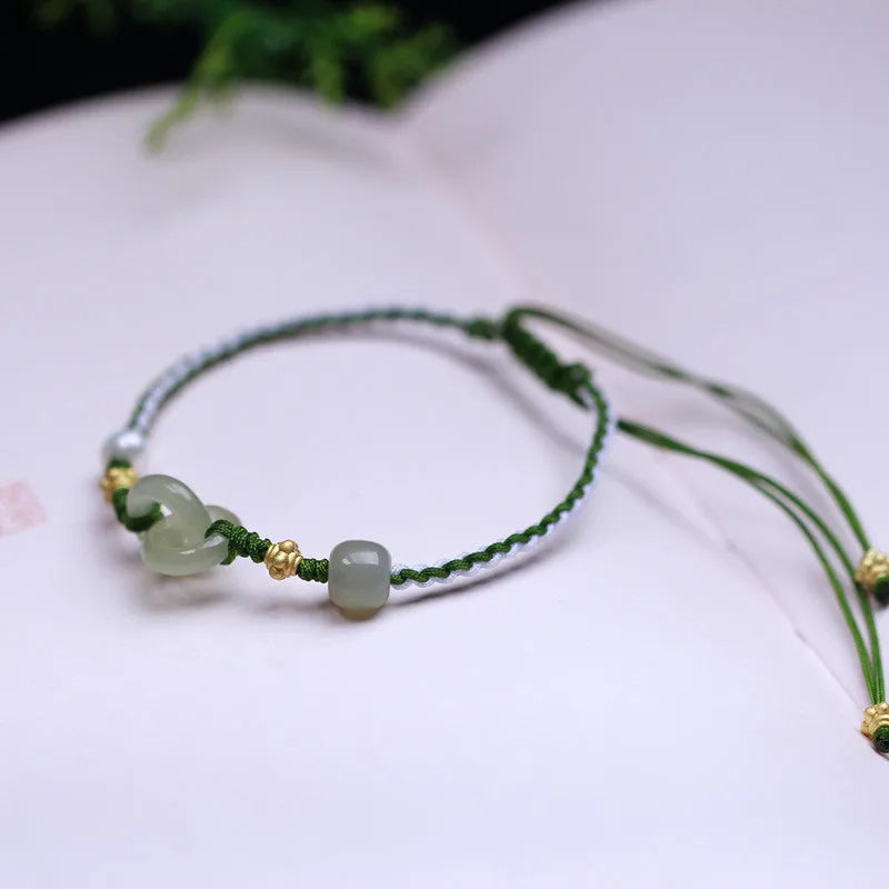 Hetian jade woven bracelet with flexible wire construction and hollow out national tide design elements