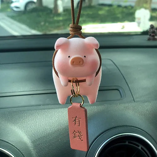 Set of eight cute cartoon pig resin car dashboard decorations on a car console