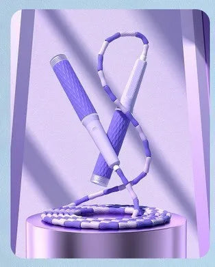 Children's bamboo bead skipping rope in blue, green, pink, or purple on a 2.8m cord.