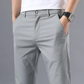 Men's summer casual trousers in straight-leg cut, thin cotton fabric, plain design, shown in black