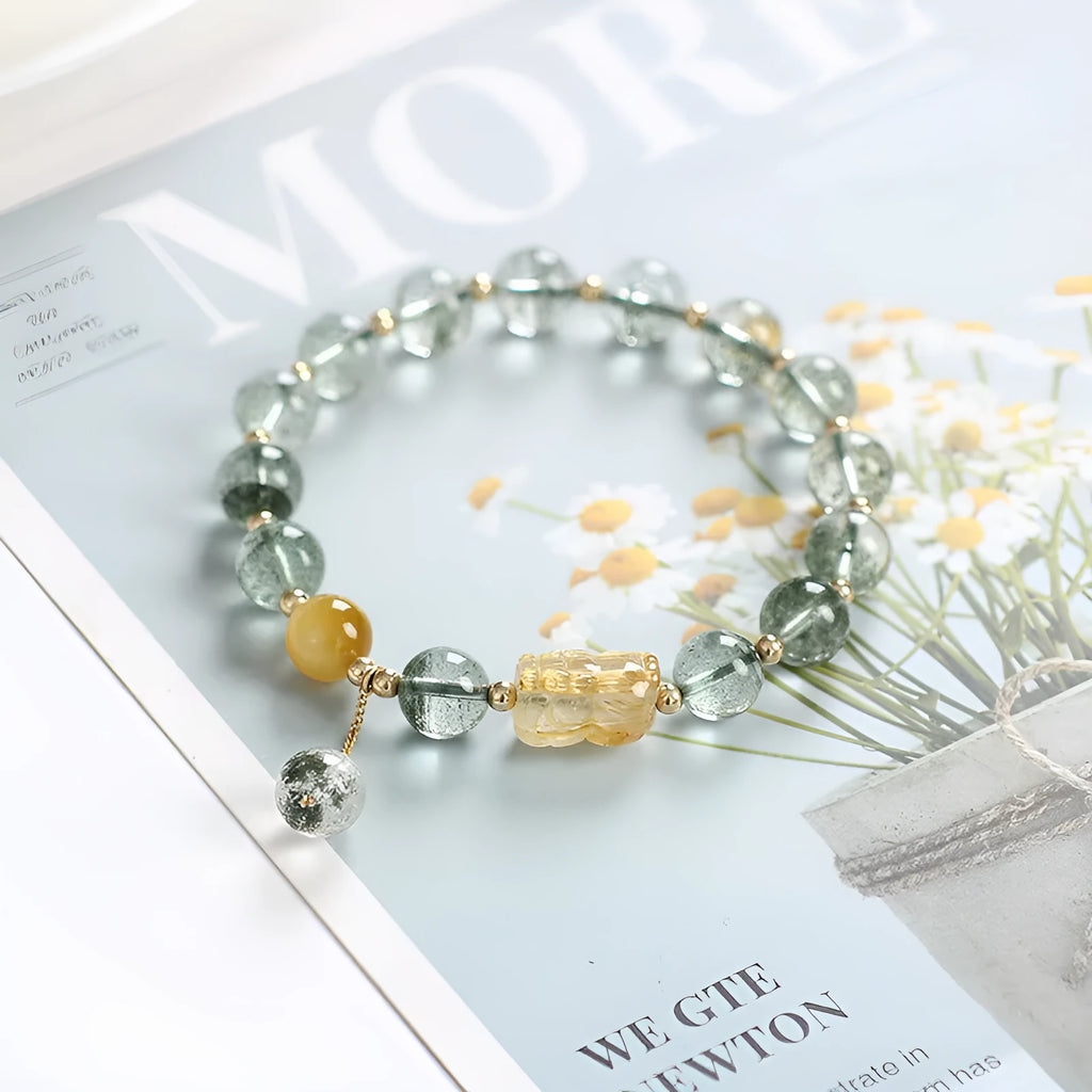 Green phantom quartz crystal bracelet with gold rutilated strands and 8mm geometric beads