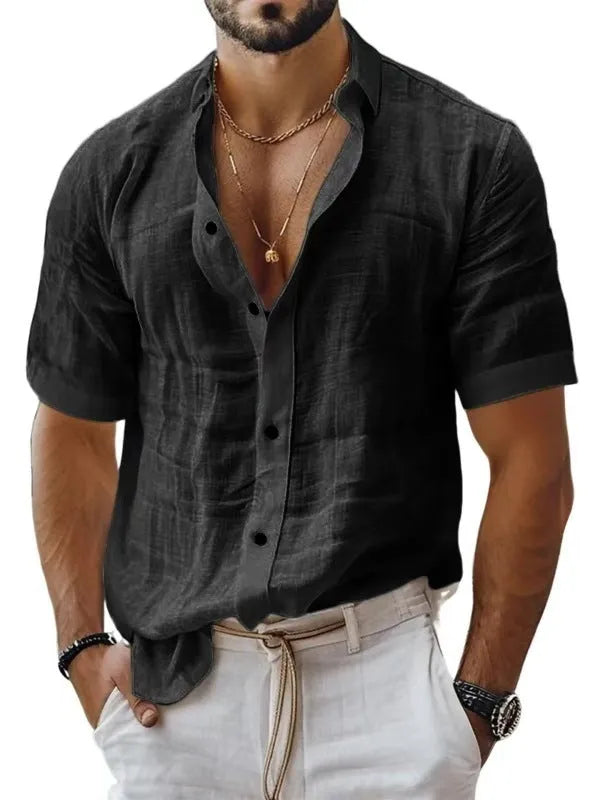 Men's solid colour short sleeve lapel shirt in light green shown on a hanger