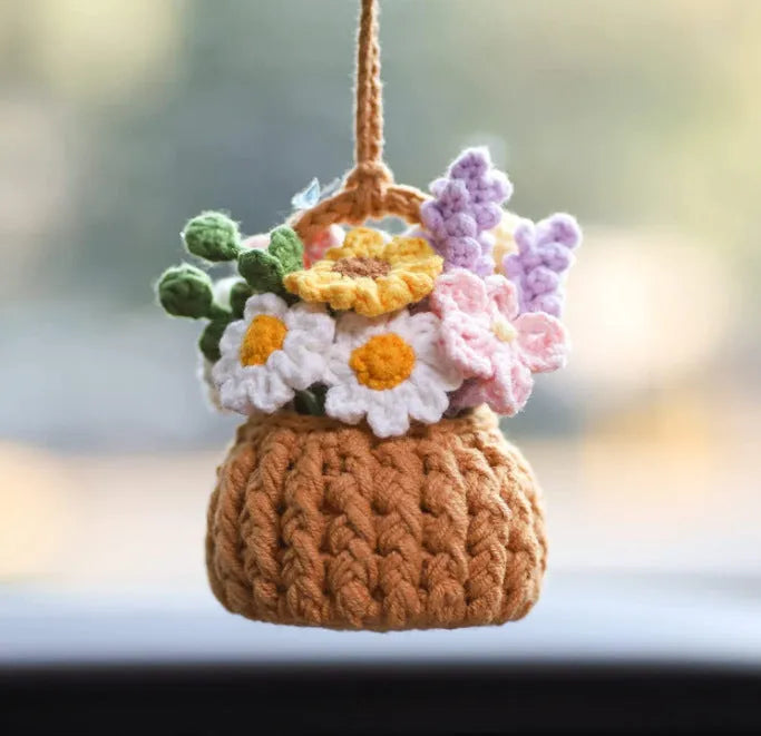 Green and white knitted wool plant ornament for car dashboard with hanging cord