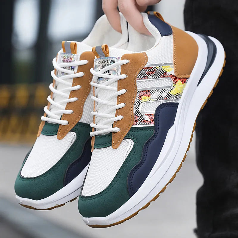 Men's white green and grey mesh casual shoes with a leather toe holder and plastic sole.