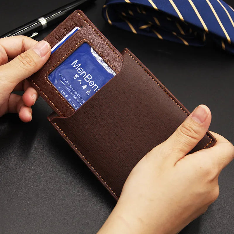 Men's black PU leather short wallet with iron-edge card-picking feature, shown with cards and coins.