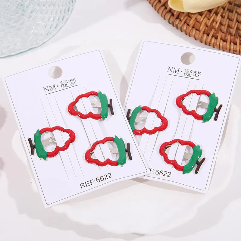 Children's cartoon fruit hair clips in plastic with cherry, apple and strawberry barrette designs