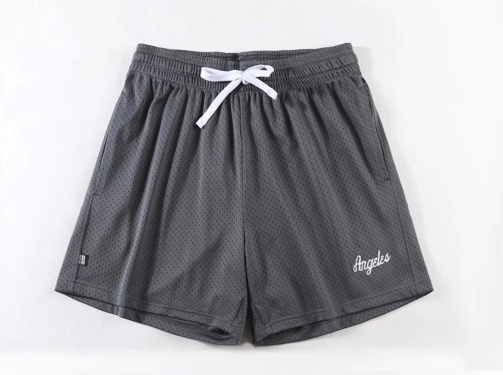 Men's black double-layer mesh sports shorts on a hanger with colour swatches showing white, yellow, green, and purple options.