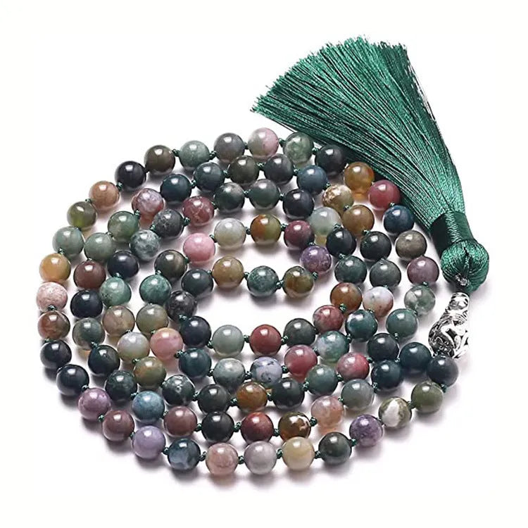 Long geometric agate and gemstone tassel necklace showing colourful beads including amethyst and lapis lazuli.