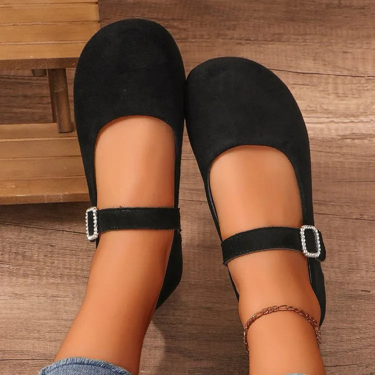 Black canvas women's fisherman shoes with rubber soles shown in low-top casual design