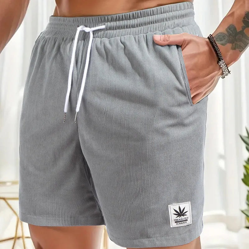 Men's drawstring waist summer shorts in black blue grey khaki colours with straight leg styling