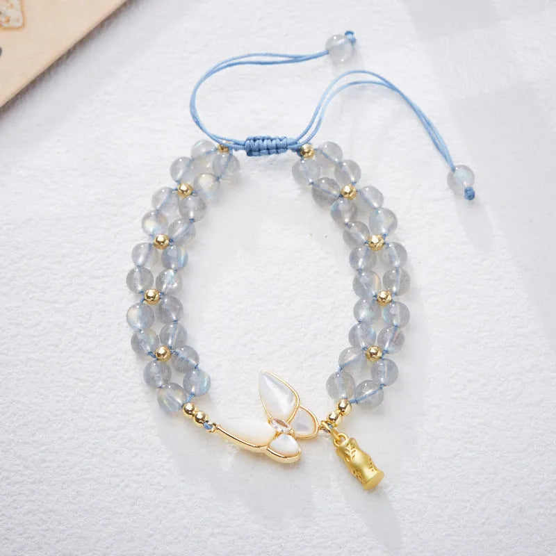 Women's aquamarine butterfly woven bracelet showing 6mm width and retro design detail