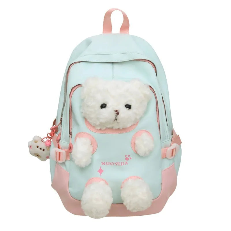 Nylon school backpack in a macaron colour with curved shoulder straps and sewing line detail.
