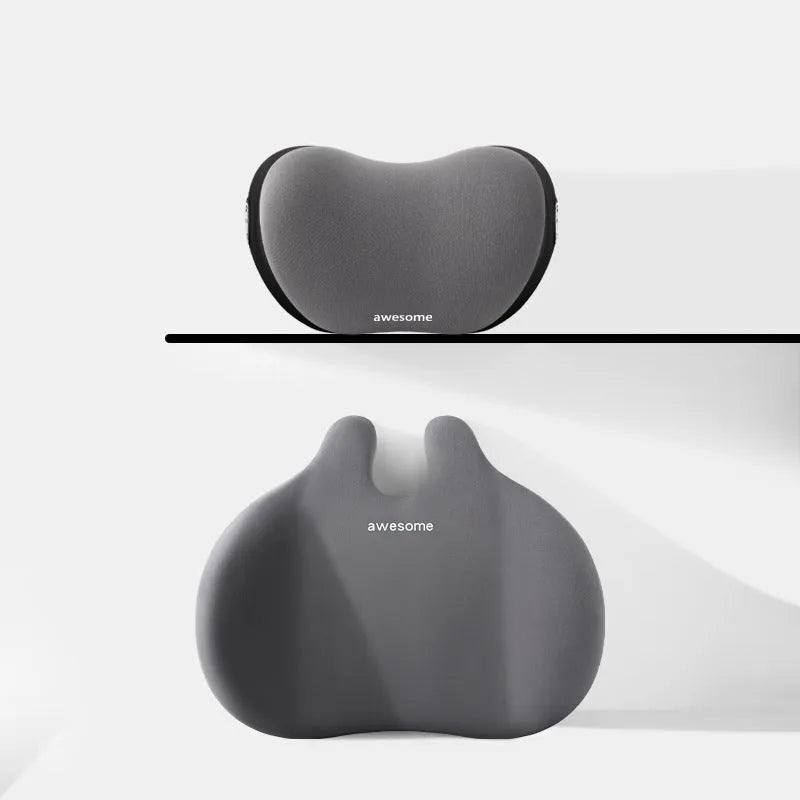Black car headrest and lumbar support pillow set with cow head design pattern.