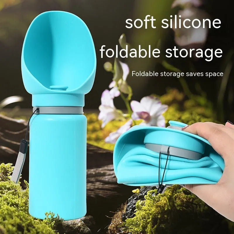 Blue 550ml folding pet water bottle in BPA-free food-grade silicone with one-button release