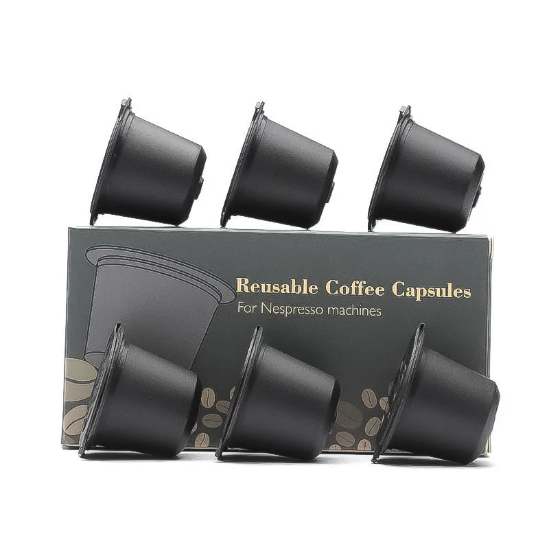 Six recyclable coffee shell filter cups in black, brown, and red plastic with a spoon