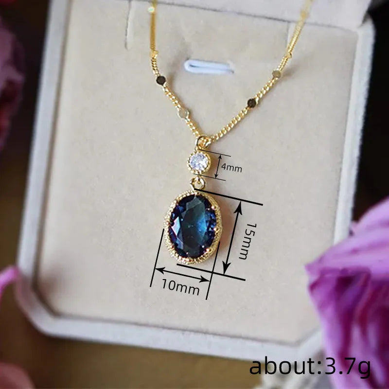 Gold colour geometric pendant on a chain, French retro necklace design