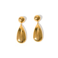 Gold coloured geometric hemisphere earrings with a dangling water drop pendant, made from stainless steel.
