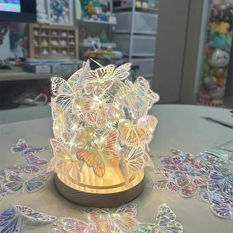 Handmade butterfly-shaped night lamp with glass shade and raw wood base, 12x15cm.