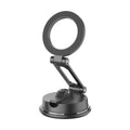 Black H154 car magnetic phone holder with suction cup mount on a car dashboard.