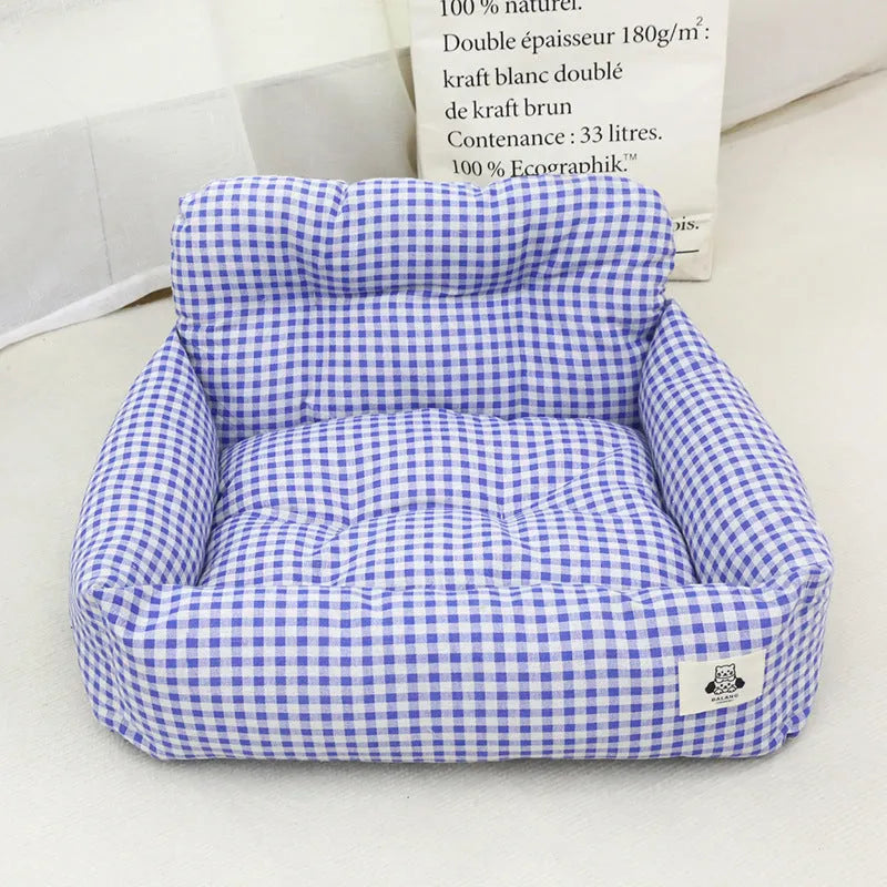 Blue plaid and grey stain-resistant cloth dog nest for car use, showing small and large size options.