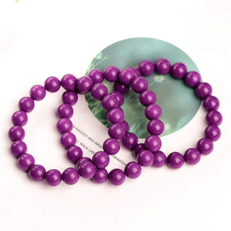 Jiuya polished purple mica crystal bracelet showing single circle design on a wrist.