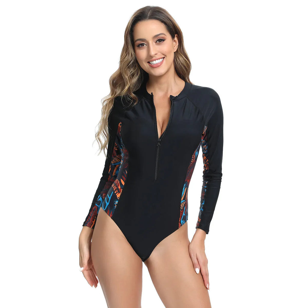 Women's long sleeve floral print one-piece swimsuit in polyester on a mannequin.