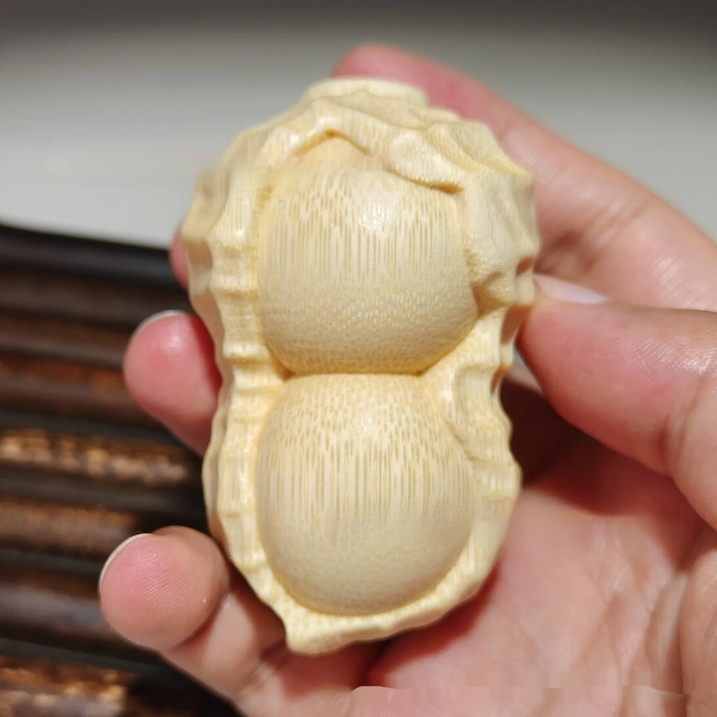 Solid bamboo carving peanut ornament with good things may happen inscription modern simplicity design