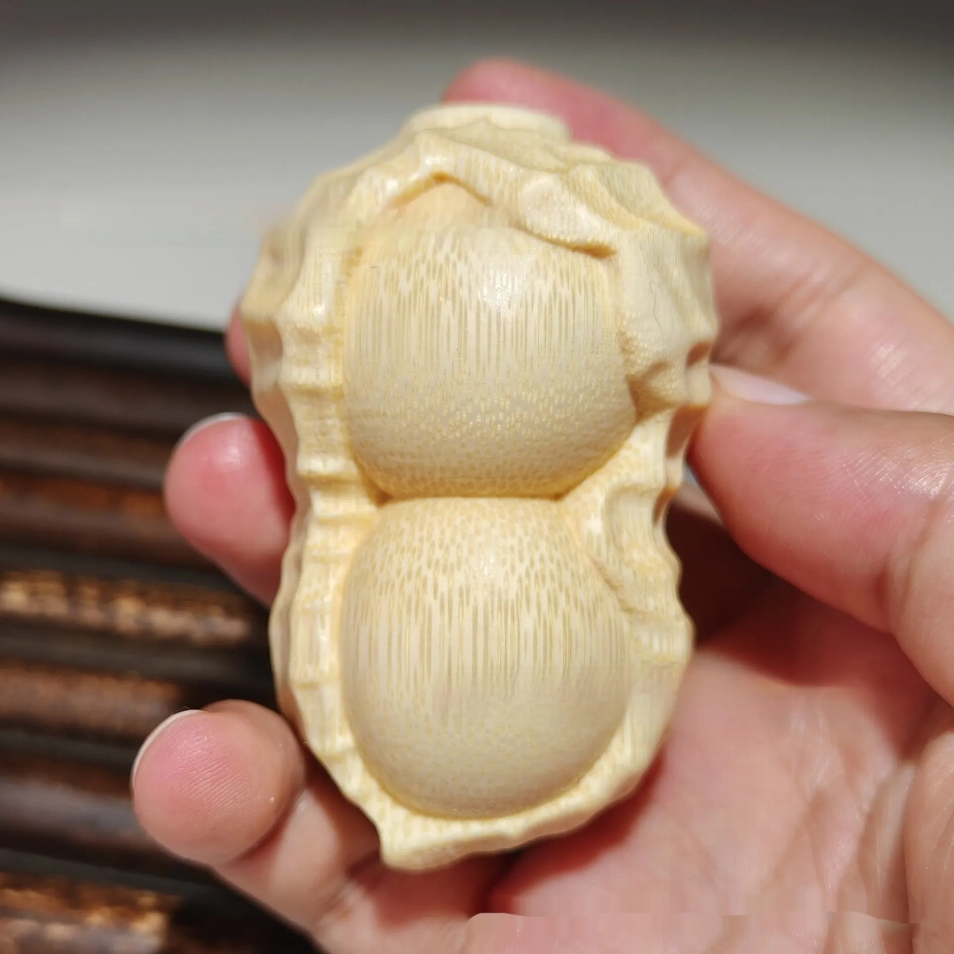 Solid bamboo carving peanut ornament with good things may happen inscription modern simplicity design