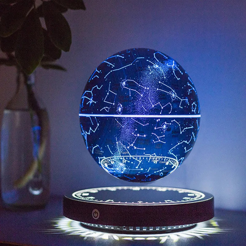 Maglev moon lamp in black, star ball shape on a bedside table with USB power