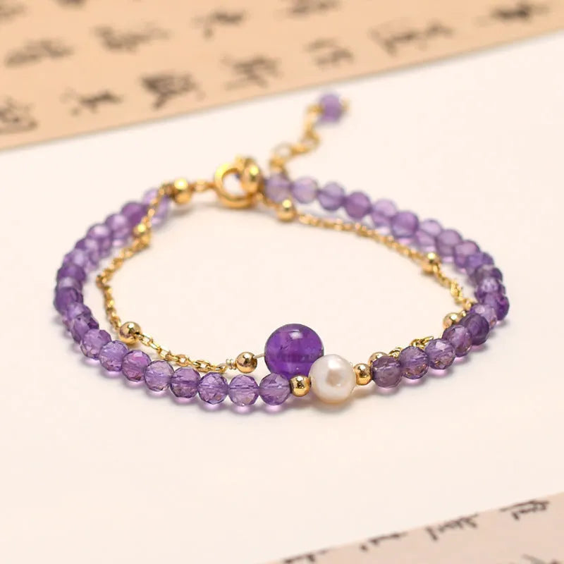 Chinese-style women's bracelet featuring genuine crystal and pearl beads with amethyst purple electroplated finish